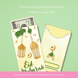 May include: Two red and gold envelopes with a crescent moon and star design. The envelopes have the text "Eid Mubarak" and are decorated with green and gold lanterns and stars. The envelopes are perfect for giving money as gifts during Eid.