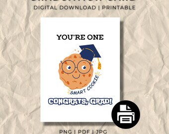 May include: A printable graduation card featuring a cartoon cookie wearing a graduation cap and glasses. The text on the card reads "You're one smart cookie. Congrats, Grad!" The card is 13.83 x 18.22 cm.