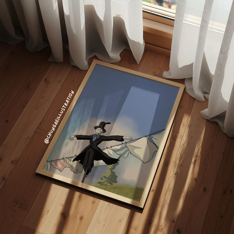 May include: A framed illustration featuring a whimsical character in a black coat and top hat, hanging laundry on a clothesline. The artwork has a light wooden frame and is set against a blue sky backdrop. The illustration is on a wooden floor with white curtains.