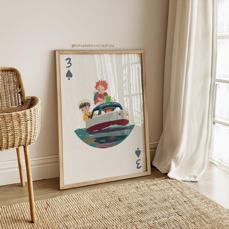 May include: A framed illustration featuring a boat with two children on it, set against a white background. The artwork is designed to resemble a playing card, with the number 3 and a spade symbol at the top and bottom. The artist's name is visible.