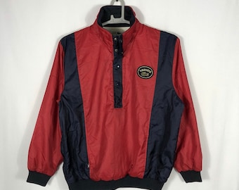 Vintage Lacoste embroidered patches logo half zipper half buttons pullover jacket sportswear active wear in red and blue in medium size
