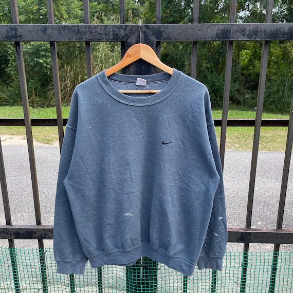 faded blue nike sweatshirt