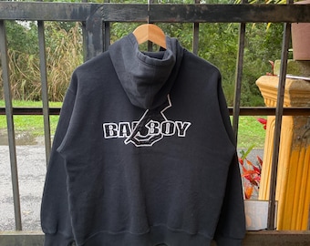 May include: Black hooded sweatshirt with a white "Baby Boy" logo on the back.