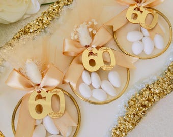 Bomboniera di compleanno personalizzata: caramelle alle mandorle in sacchetto di tulle ad anello, regalo ricordo per il battesimo