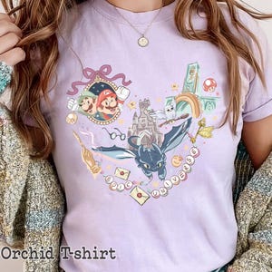 Comfort Colors Retro Epic Universe Orlando 2025 Shirt,Orlando Park Epic Universe Shirt, Coquette Bow Mario Baby Tee How To Train Your Dragon