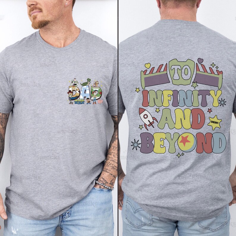 May include: A heather gray t-shirt with a colorful graphic on the front that says "DAD" with cartoon characters. The back of the shirt has the phrase "TO INFINITY AND BEYOND" in a retro font with a rocket ship and star accents.