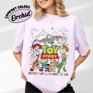 May include: A white ceramic mug with a black handle and the text "But First, Coffee" in a handwritten style. The mug is on a white surface. The mug is 4 inches tall.