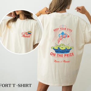 Pizza Planet Shirt, Keep Your Eyes On The Prize Tee, Toy Story Aliens Claw Machine Sweeater, Toy Story Family Shirt, WDW Hollywood Studios