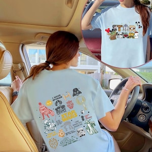 May include: Pale blue Star Wars t-shirt featuring character illustrations and the text "I Have Spoken", "Star Wars", and "A Galaxy Far, Far Away". The front of the shirt has the Star Wars logo and characters.