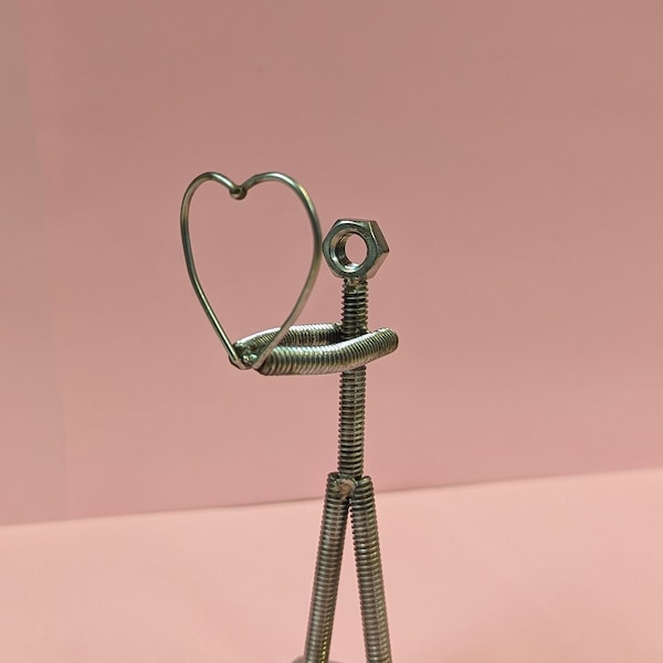 Rustproof Romance: Stainless Steel Nuts & Bolts Sculpture