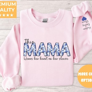 Custom This Mama Wears Her Heart On Her Sleeve Hoodie, Personalized Mom Sweatshirt With Kids Names, Cute Momma Outfit, Mothers Day Gifts