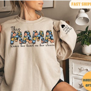 Custom This Mama Wears Her Heart On Her Sleeve Hoodie, Personalized Mom Sweatshirt With Kids Names, Cute Momma Outfit, Mothers Day Gifts