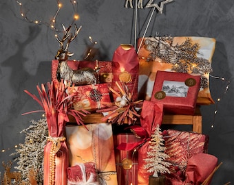 Doppelseitiges Geschenkpapier Weihnachten. Zeitung mit 5 verschiedenen Bögen und 10 Motiven.