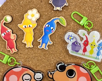 Pikmin inspired pins and keychains