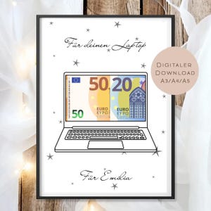 May include: A framed print featuring a laptop illustration with a Euro banknote displayed on the screen. The text "Für deinen Laptop" and "Für Emilia" are written above and below the laptop. The print also includes the text "DIGITALER DOWNLOAD A3/A4/A5".