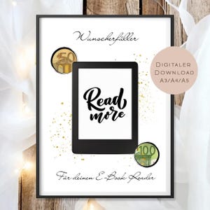 May include: Framed print with the words "Read more" on a white background. The print includes a digital download option and features a black e-reader graphic, gold accents, and text in German.