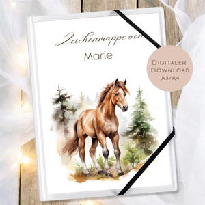 May include: White binder with a watercolor illustration of a brown horse in a forest setting. The binder has the text "Zeichenmappe von Marie" and a black elastic band closure. A digital download option is also available.