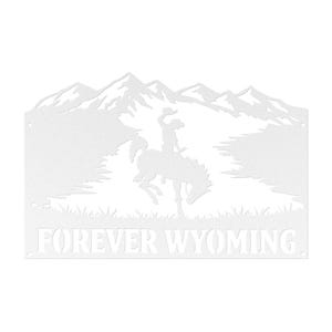 May include: A white metal wall sign featuring a cutout silhouette of a bucking horse and rider against a mountain range backdrop. The text FOREVER WYOMING is displayed in bold, capital letters along the bottom edge of the rectangular metal piece.