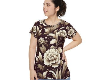 May include: A brown t-shirt with a white floral print. The flowers are large and detailed, with a vintage style.