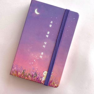 Twilight Meadows Journal: A6 Leatherette Notebook with Bunny Design