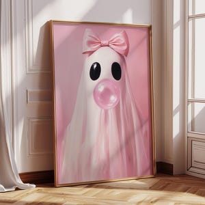 May include: A pink ghost with a pink bow and a pink bubble gum in its mouth. The ghost is on a pink background.