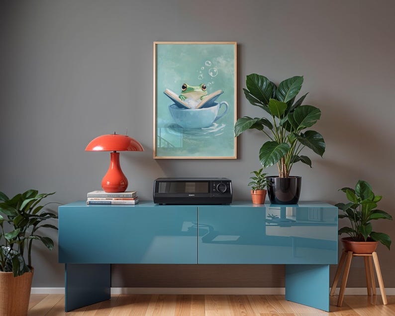 Cute frog reading book in teacup digital wall art
