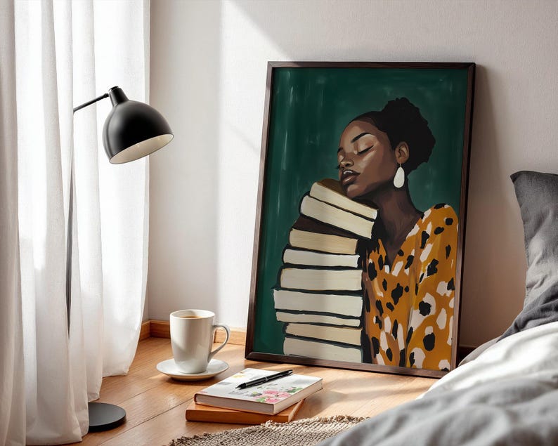 May include: A framed art print featuring a woman with closed eyes, leaning against a stack of books. The woman wears a yellow and brown patterned dress and white earrings. The background is green.