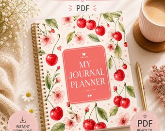 May include: A spiral-bound journal planner with a cream-colored cover featuring a watercolor pattern of red cherries, green leaves, and pink blossoms. A central coral-colored rectangle displays the text MY JOURNAL PLANNER in white capital letters.