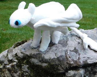 Handmade posable Light Fury plush inspired by How To Train Your Dragon Toothless