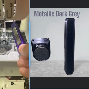 May include: Two 3D printed chair leg caps in metallic dark grey. The caps are designed to protect floors from scratches.