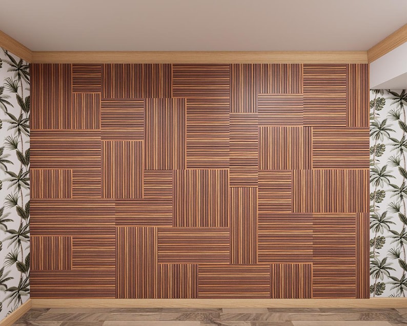 May include: A wall covered in rectangular wooden panels featuring alternating vertical and horizontal striped patterns in shades of brown and tan. The panels are arranged in a grid-like mosaic design, framed by light-colored wood trim.