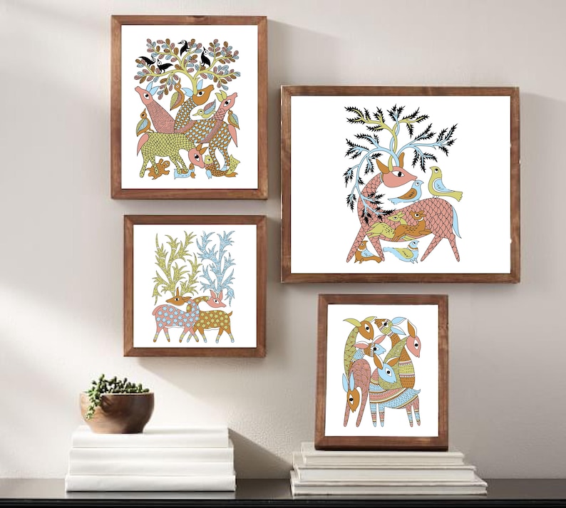 May include: Four framed art prints in a folk art style. The prints depict colourful illustrations of deer, birds, and trees in a whimsical design. The frames are made of dark wood, and the artwork is displayed on a white background.