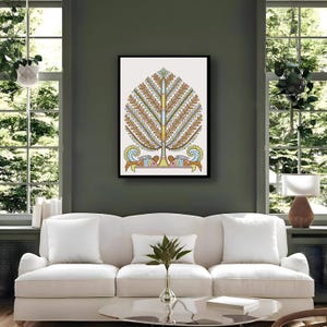 May include: A framed art print with a decorative tree design in shades of brown, orange, and blue. The artwork, featuring two fish, is displayed in a living room with a white sofa and large windows, creating a bright atmosphere.