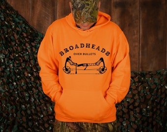 May include: Orange hooded sweatshirt with a black graphic of a bow and arrow and the text "Broadheads Over Bullets".