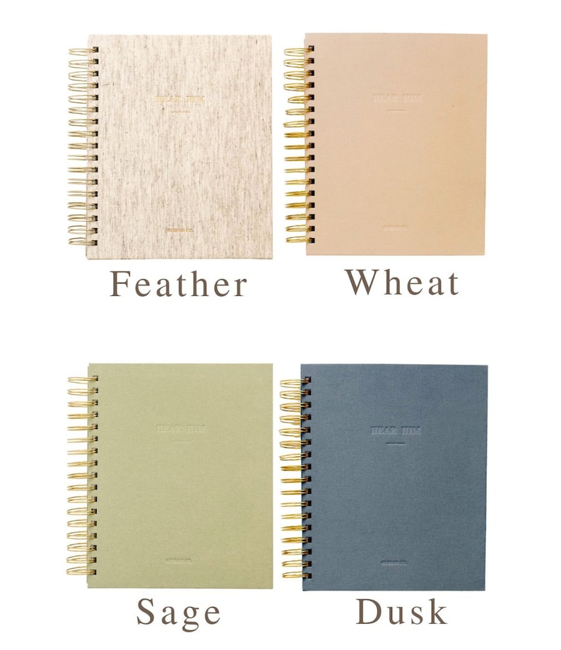 May include: Four spiral bound notebooks with different colored covers. The covers are labeled "Feather", "Wheat", "Sage", and "Dusk". Each cover has the text "Dear Him" embossed on the front.