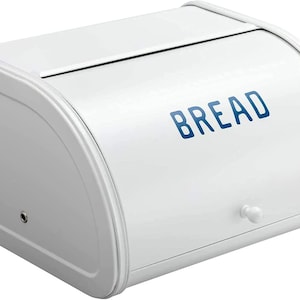 May include: White metal bread box with a rounded lid and a blue "BREAD" label on the front.