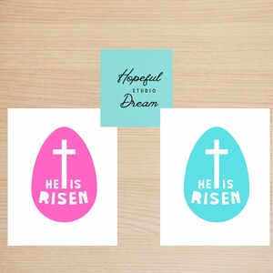 Tarjeta cristiana de Pascua "Él ha resucitado" - Elegante diseño de huevo de Pascua - Disponible en azul y rosa - Saludo de Pascua perfecto para familiares y amigos