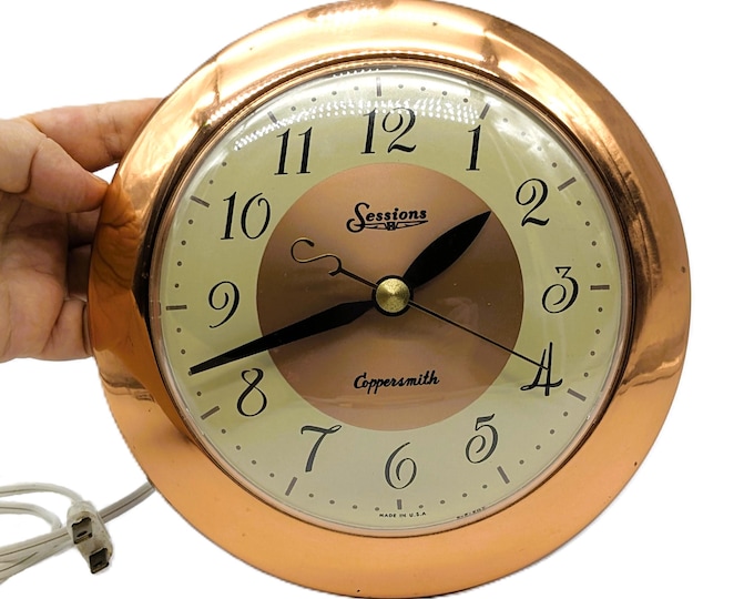 Featured listing image: Electric Wall Clock Copper Color | Vintage Made in USA Sessions Coppersmith Clock 7.5″  | Mid Century Modern Wall Clock  | 1950s Home Decor