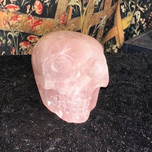 3.59 Inch Long and 2.5 inch wide Rose Quartz Crystal Skull