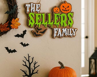 Personalized Halloween Family Name Sign Custom Wooden Door Hanger with Pumpkins and Bats Spooky Fall Wall Decor Red Green Purple