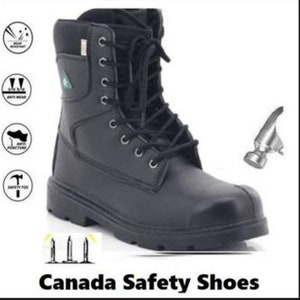 May include: Black leather work boots with a lace-up fastening. The boots have a steel toe and are designed for safety. The boots have a thick rubber sole and are designed for durability. The boots are labelled "Canada Safety Shoes".