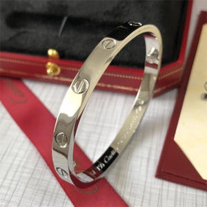 Pre-own vintage vintage LOVE bracelet 18k white gold  size 17 with screwdriver with authentic paperwork
