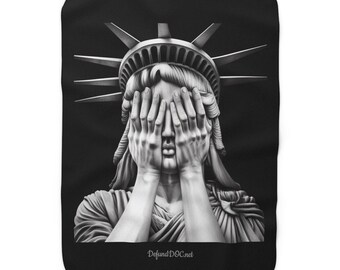 May include: Black and white image of the Statue of Liberty with her hands covering her eyes. The text "Defund'D.C.net" is at the bottom of the image.