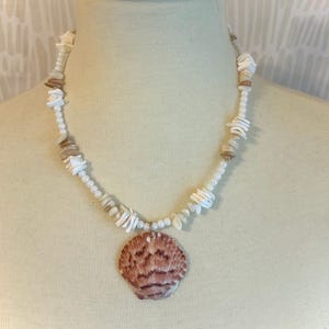 beaded necklace with large pink shell