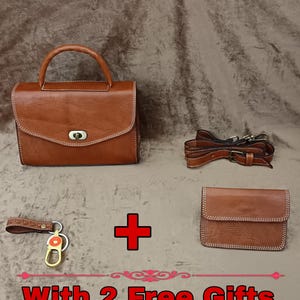 May include: A set of brown leather goods, including a handbag with a top handle, a crossbody strap, a small wallet, and a keychain. The items are stitched with white thread. The image includes the text "WITH 2 FREE GIFTS".