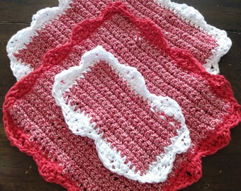 2 red and white kitchen washcloths with edging, includes smaller version