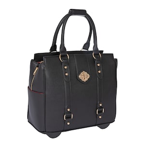 May include: Black rolling tote bag with a structured design. Features a top handle, two shoulder straps, and a gold-colored clasp. Includes a side pocket with a gold zipper and gold hardware accents. The bag has two wheels on the bottom.