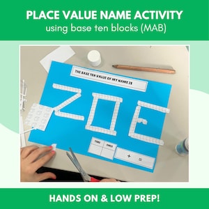 May include: A hands-on educational activity featuring a blue paper with the name "ZOE" constructed from base ten blocks. The text "PLACE VALUE NAME ACTIVITY" and "HANDS ON & LOW PREP!" are visible. Scissors and other supplies are also present.