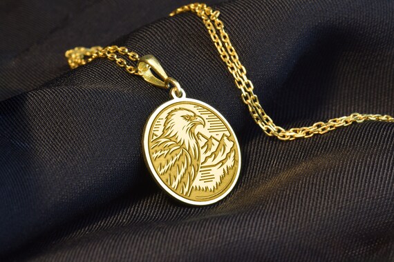 14k Yellow Gold Small 2D Landing Eagle Necklace - Black Bow  14K Yellow Gold Eagle Pendant With 0.8mm Box Chain - 20 inch main image 1