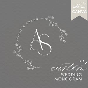 May include: A white custom wedding monogram design on a grey background. The design features the initials "AS" within a floral wreath, with the names "Ariane & Shawn" encircling the top. The words "custom wedding monogram" are written below.